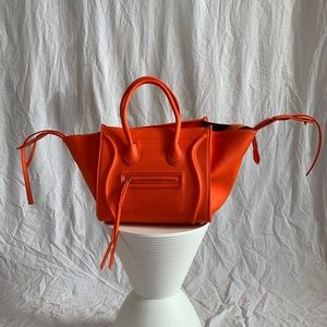 Bright orange neon phantom bag